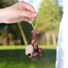 Campanilla de Viento Colgante de Cáscara de Fruta Natural Indonesia Estilo Bosque Hecha a Mano Planta Curativa Fruta Decoración Colgante para Mochila Llaves Venta al por Mayor