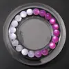 Cuentas redondas de resina que cambian de color con luz UV para DIY, abalorios hechos a mano, cuentas sueltas, pulsera, collar, accesorios de joyería, llavero, accesorios decorativos