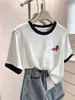 Hombro normal Algodón de copo de nieve Cuello redondo Bloque de color Manga corta Camiseta Diseño para mujer Sentido de la moda Nicho Moderno Elegante Top Capa base Verano