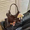 Bolso Bandolera para Mujer 2026 Verano Nueva Moda Lazo Bolso Dumpling Versión Coreana Nicho Bolso de Mano Simple Bolso de Hombro