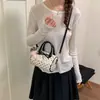 Bolsa de mão feminina estilo coreano transfronteiriça 2026 novo modelo acabamento em renda alto valor elegante para o dia a dia bolsa almofada