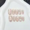 Uñas postizas hechas a mano con lunares de galaxia estilo Hepburn cortas de alta gama puntas de uñas desmontables venta al por mayor