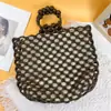 2025 Diseño de Nicho Moda Retro Bolso de Mano Tejido con Cuentas Hecho a Mano Hueco con Cuentas de Madera Simple Casual Bolso de Playa
