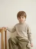 Nuevo suéter de lana para niños otoño e invierno 2026, suéter de punto de cuello alto estilo coreano, unisex, suéter cálido de capa base