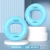 Ejercitador de Agarre de Mano de Silicona Equipo para Entrenar la Fuerza de la Mano Hombres y Mujeres Bola de Fuerza de Agarre Fuerza de Muñeca Entrenamiento Muscular Fuerza de Cinco Dedos Anillo de Agarre de Rehabilitación