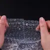 Bolsa de burbujas Bolsa de burbujas Lote pequeño Transparente Nuevo material Bolsa de burbujas al por mayor Bolsa de película de burbujas de espuma a prueba de golpes