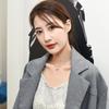 Collar de acero de titanio con doble anillo con incrustaciones de circonitas simples estilo celebridad de Internet para mujer, cadena de clavícula digital romana, venta al por mayor transfronteriza