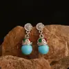 Nuevos Pendientes de Botón de Aleación Estilo Chino Plata de Tíbet Turquesa Moda Versátil Nicho Pendientes de Gama Alta Diseño Elegante Pendientes para Mujer