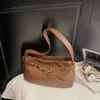 Nova Bolsa de Ombro Casual de Nicho Outono e Inverno 2025 Estilo Coreano Bolsa de Mão para Sobrancelha Bolsa Transversal Diária para Mulheres