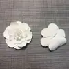 Zapatos infantiles flor PU blanco negro DIY hechos a mano zapatos de flor accesorios para zapatos accesorios de ropa bolsos joyería fabricantes al por mayor