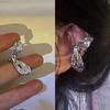 Lujo ligero alas de mariposa clip para oreja de pedrería femenino nicho de alta gama aretes de elfo sin oreja nuevo clip para hueso de la oreja