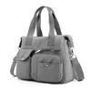 2026 Nuevo Estilo Bolso de Hombro para Mujer Estilo Europeo y Americano Bolso Cruzado de Nylon para Mamá Bolso de Viaje de Gran Capacidad Bolso Tote
