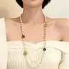 Colar de Pérola Trevo de Quatro Folhas Totalmente Cravejado de Diamantes, Venda Quente Transfronteiriça, Corrente de Suéter Simples Versátil para Outono e Inverno, Acessório de Nicho de Alto Padrão