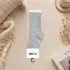 Calcetines de encaje al por mayor para mujer, calcetines de media pantorrilla estilo japonés suave, calcetines versátiles simples Lolita JK para mujer