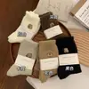 Calcetines de felpa para mujer, lana australiana de invierno, nuevo estilo 2026, calcetines populares hasta la pantorrilla, engrosados y con forro de felpa para abrigar, adecuados para usar después del parto