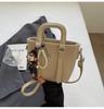 Bolsa de Mão e Bolsa Transversal Tendência Estilo Coreano Nova Primavera 2026 com Textura Retrô de Alto Padrão, Bolsa Saco Fashion e Versátil