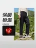 Pantalones casuales para hombre transfronterizos, nuevo estilo otoño e invierno, resistentes a las arrugas, forrados de forro polar, de pierna recta con cintura elástica y textura fluida