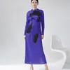 Conjunto de dos piezas de alta gama para mujer con plisados estilo Miyake: top estampado y falda con abertura