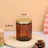 Venda por atacado de castiçais coloridos de boca larga, garrafas vazias, porta-velas aromáticos sem chama, castiçais de vidro marrom com tampas, enfeites decorativos.