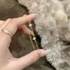Collar de Trébol de Cuatro Hojas con Circonita Simple Estilo Europeo y Americano Transfronterizo para Mujer, Lujo Ligero, Elegantes Pendientes, Pulseras y Collares de Gama Alta al por Mayor