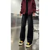 Jeans de trabajo deconstruidos con remaches de moda para hombre, pierna recta holgada, estilo callejero retro americano, pantalones ligeramente acampanados geniales