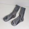 Calcetines blancos nuevos de otoño e invierno con tacón y letras, calcetines deportivos de tubo largo, calcetines negros de línea gruesa para hombre, calcetines de tubo medio de moda de algodón