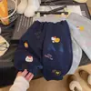 Pantalones jogger nuevos para niñas con forro de felpa, estampado de dibujos animados moderno, pantalones largos casuales y cómodos, pantalones de felpa para bebé para otoño e invierno