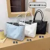 Bolso Tote Personalizado de Gran Capacidad con Patrón de Estrellas para Mujer 2026 Nuevo Simple Moda Bolso de Hombro Único y de Mano Lona para Viajes