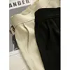 Falda de paraguas con tacto sedoso en blanco/negro, falda midi elegante de alta gama, falda suelta de línea A de cintura alta, Verano 2026