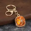 Llavero cuadrado de esmalte estilo étnico con incrustaciones de diamantes, colgante para bolso de aleación con patrón de esmalte, regalo de recuerdo de viaje al por mayor