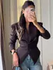 Ropa de mujer transfronteriza europea y americana 2026 nuevo blazer ajustado, que realza la figura, asimétrico con mangas largas, top moderno y elegante