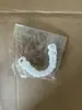 Pegatinas de Prótesis Dental Artificial de Punto Transfronterizo Maquillaje de Sonrisa Hermosa Temporal para Escenario Plástico Arriba y Abajo Set de Dientes Blanqueadores