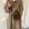 Bolso de mano de alta gama vintage, versátil y elegante, nuevo diseño de bloques de color, bolso de hombro elegante y moderno para mujer, bolso tipo cubo de moda para mujer