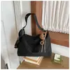 Bolsa tote vintage transfronteiriça 2026, bolsa de ombro versátil, mochila da moda e tendência, alto valor estético, nicho coreano