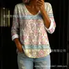 Nova camisa feminina de manga comprida com botões e gola V estampada transfronteiriça, elegante e estilosa para o trabalho, top casual único e moderno
