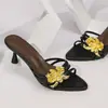 Nuevas Sandalias de Moda de Verano 2025 Estilo Francés Flor de Metal Talla Grande Pantuflas de Tacón de Aguja Comercio Transfronterizo para Mujer