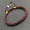 Algodón de fibra cuerda roja elástica fabricantes al por mayor pulsera tejida con cuentas de cola estilo nacional alambre joyería deshilachada