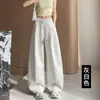 Calça feminina off-white de perna larga e corte curvo, novo estilo outono, modelagem solta, calça banana com punho, calça de moletom esportiva versátil com cintura elástica