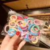 Elástico de cabelo infantil Cor de doce Anel de toalha Alta elasticidade não machuca o cabelo Fofo coreano Margarida Bolsa de armazenamento 50 elásticos de cabelo