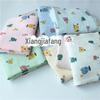 Crepe de algodão Cartoon Seersucker Baby Gaze Dupla Cobertor Pequeno Tecido Pijama Tecido