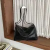 Bolso de mujer de gran capacidad, nuevo bolso de hombro casual para viajes cortos de otoño 2026, bolso de mano versátil de alta gama para el día a día