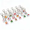 Llavero de Navidad de dibujos animados con luz de un solo botón para aliviar el estrés, juguete de botón para aliviar el estrés, colgante, regalo navideño