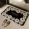 Alfombrilla de suelo floral de tierra de diatomeas de nuevo estilo en un estilo de lujo ligero, absorbe el agua y se seca rápidamente, felpudo antideslizante para entrada de baño