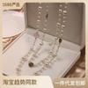 Collar largo de perlas multicapa estilo Xiao Xiang con diseño de camelia, estilo coreano, con cadena de lana rosa, para mujer.