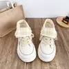 Zapatillas de lona de caña alta estilo coreano para mujer, nicho primavera estudiante chic, suela gruesa, doble uso, zapatos blancos, lindos y peculiares, zapatillas deportivas 2026