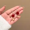 Pendientes rojos de Año Nuevo para mujer, otoño e invierno, con lazo, con clip para las orejas, nuevos pendientes de perla de Año Nuevo 2024
