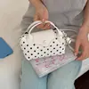 Bolso de mano minimalista de lunares estilo coreano para mujer, nuevo bolso de mano pequeño de moda 2026 con un toque de alta gama, bolso de hombro y cruzado