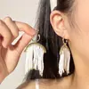 Nuevos pendientes de perla elegantes exagerados aguja de plata pendientes retro pendientes de borla nupciales europeos y americanos simples para mujer
