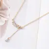 Joyería transfronteriza europea y americana: collar de borla de espiga de trigo, cadena para la clavícula simple de lujo ligero incrustada con diamantes, colgante de hoja de hada para mujer, venta al por mayor