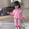 Traje deportivo de estilo coreano para niñas, conjunto de dos piezas con pantalón y parte superior con solapa de dibujos animados de estilo occidental para primavera y otoño.